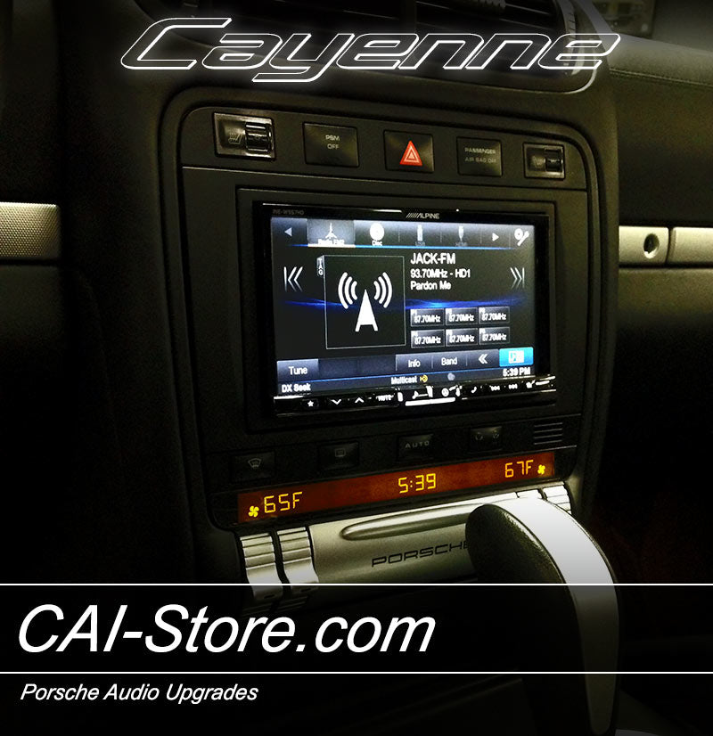 Aftermarket radio installed in a Porsche Cayenne center console