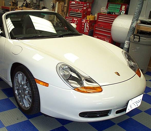 White Porsche 996 in the CAI workshop